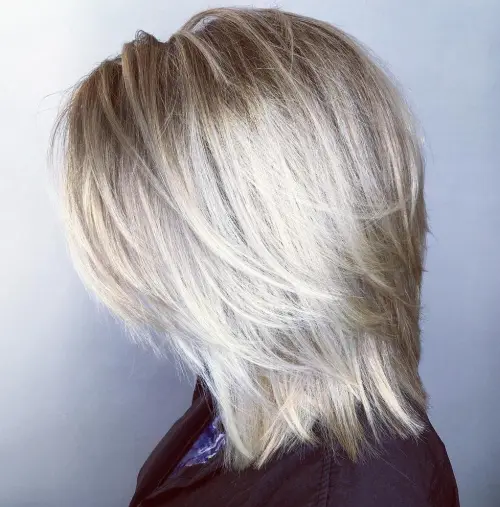 60 Essential Shag Hairstyles for Every Hair Type and Length 27 Mid-Length Blonde Layered Hairstyle