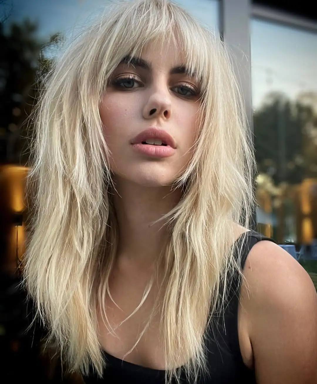 Wispy Long Blonde Shag with Bangs
