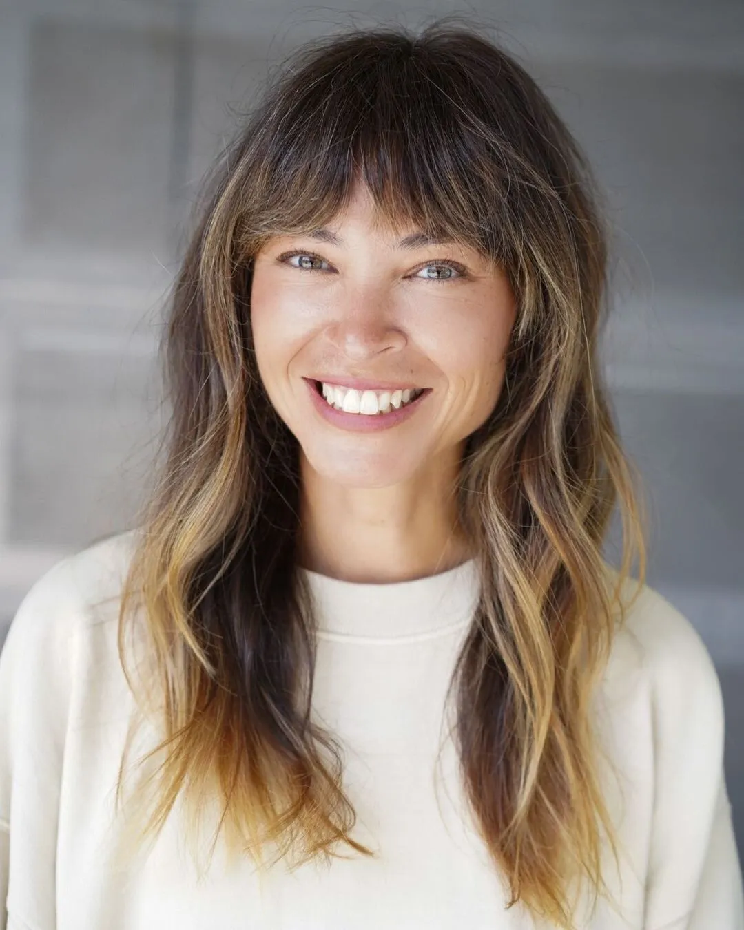 Feathered Bangs and Long Choppy Layers