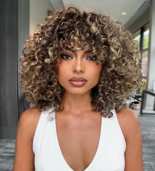 Sparkling Layered Curly Bob Shoulder Length Layered Curly Hair and Bangs